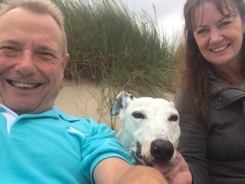 Photo of Richard and Nikki With Their Rescue Greyhound Dog Boo